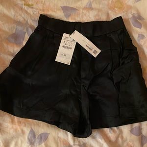 New black silk shorts